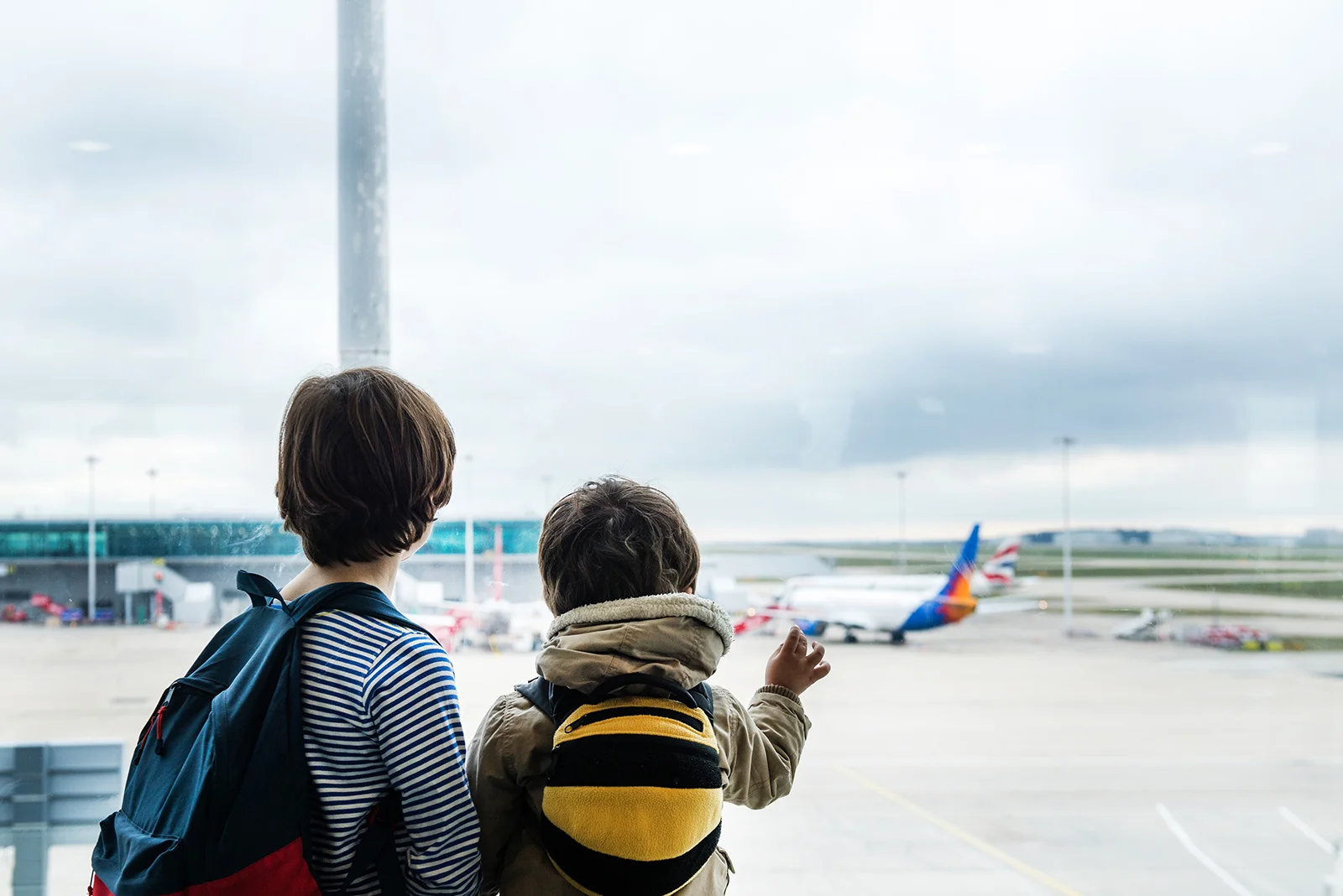 Your Guide to Flying With Kids of Every Age